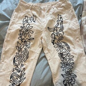 Fun barrel leg jeans with black embroidered(?) design
